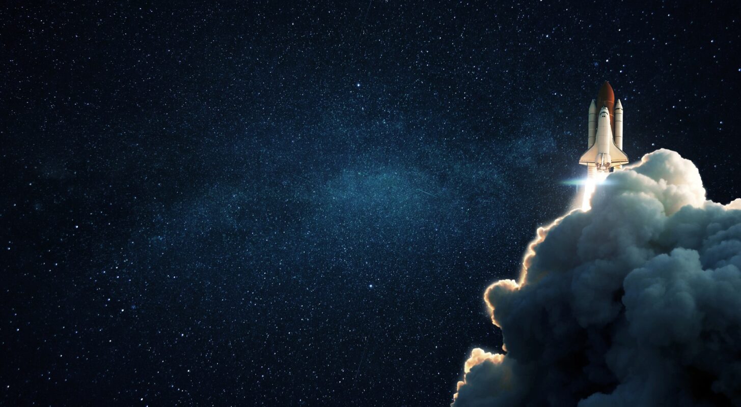 New space shuttle rocket with smoke and blastoff successfully lift off into stellar outer space